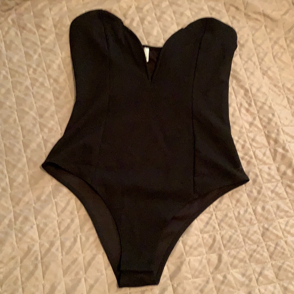 Deep v, structured body suit. Never worn.